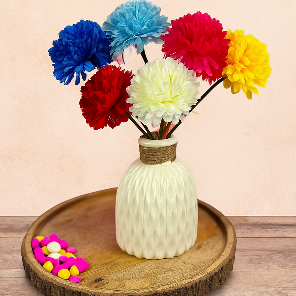Colorful artificial flowers in a textured vase on a wooden tray with 'Dekorly' branding.