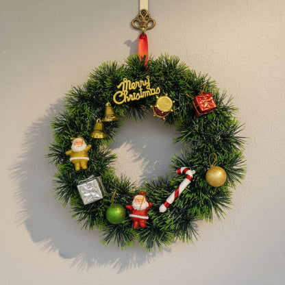 Decorative Christmas wreath with ornaments on a plain background

