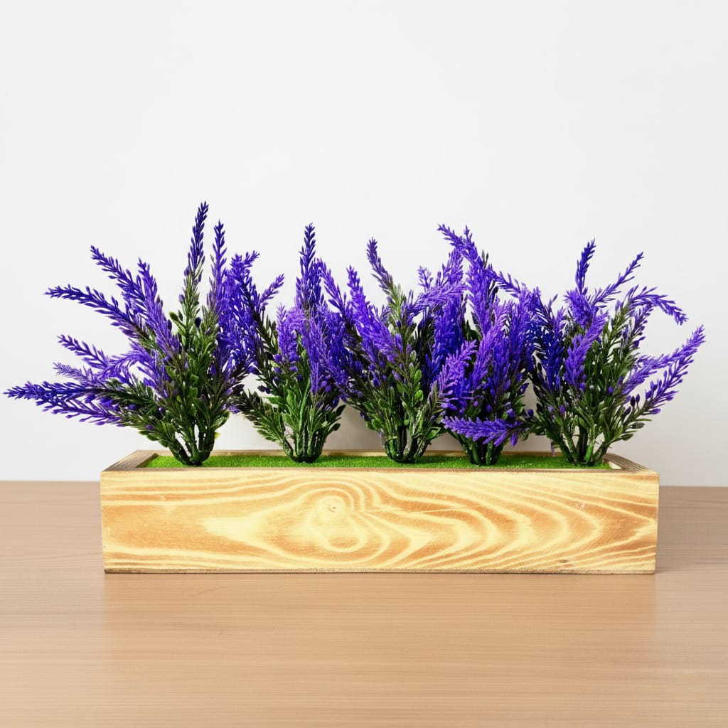 Wooden planter with purple artificial plants on a light background