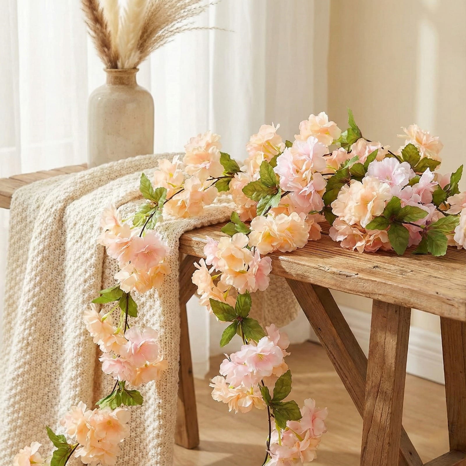 Decorative floral garland on a wooden bench with a neutral background